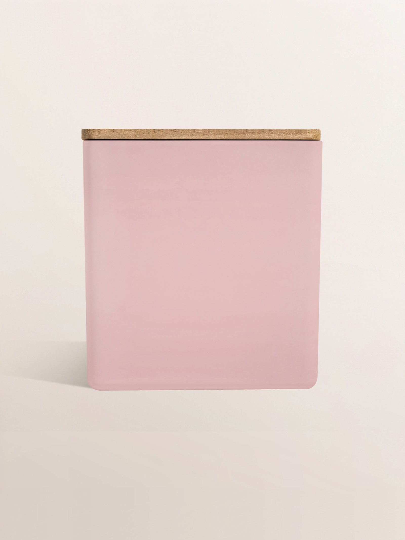 Blush pink jar with a wood lid