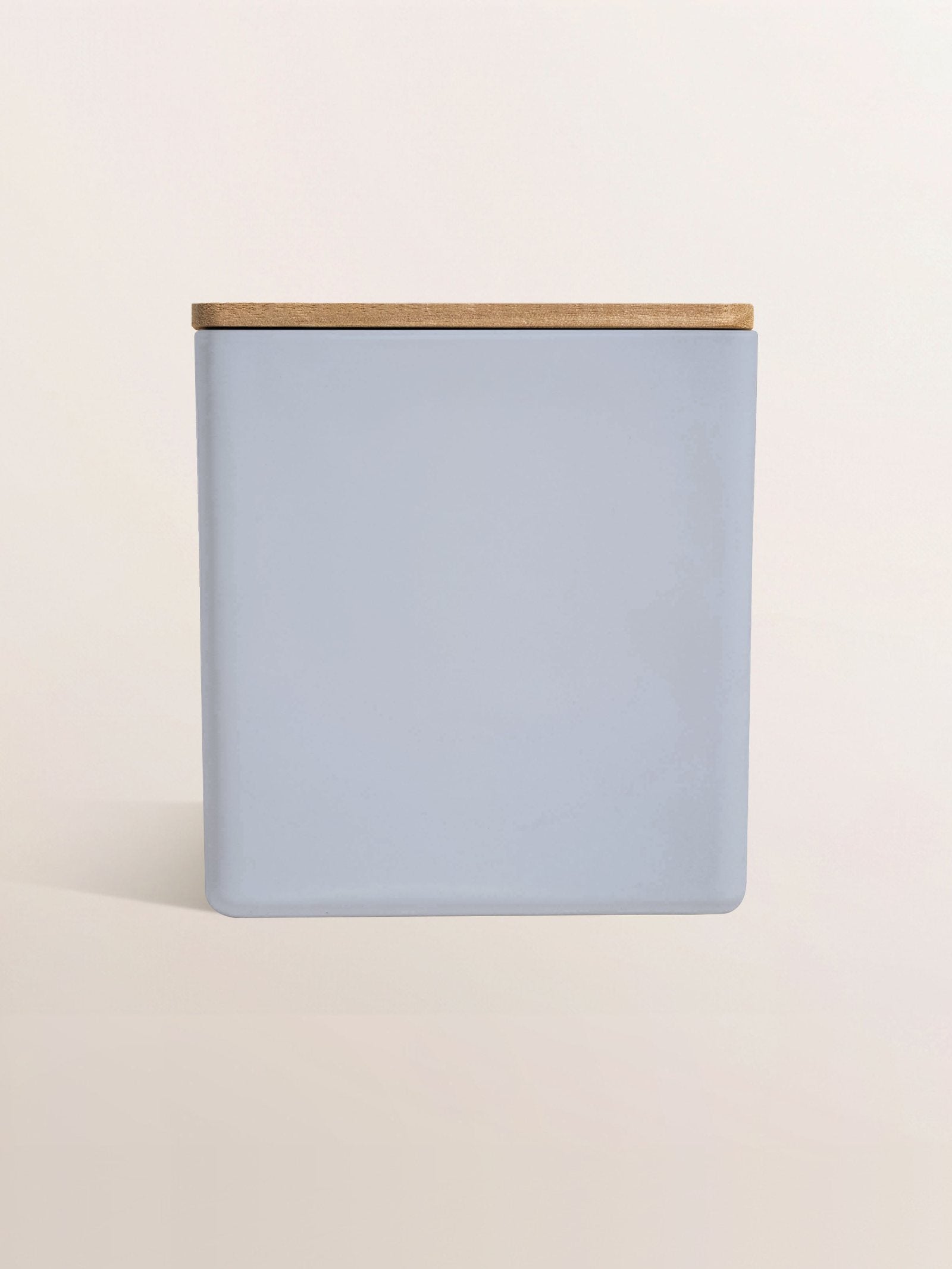 Powder blue jar with a wood lid