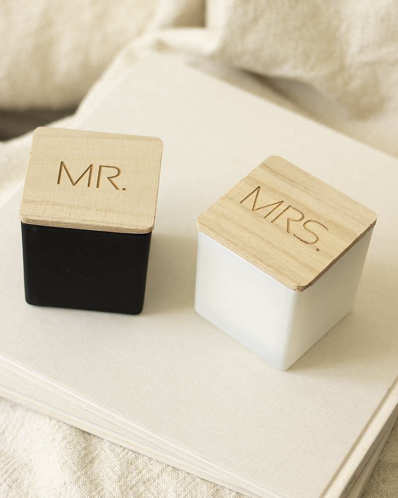 Mr. and Mrs. candles with engraved wooden lids, one black and one white