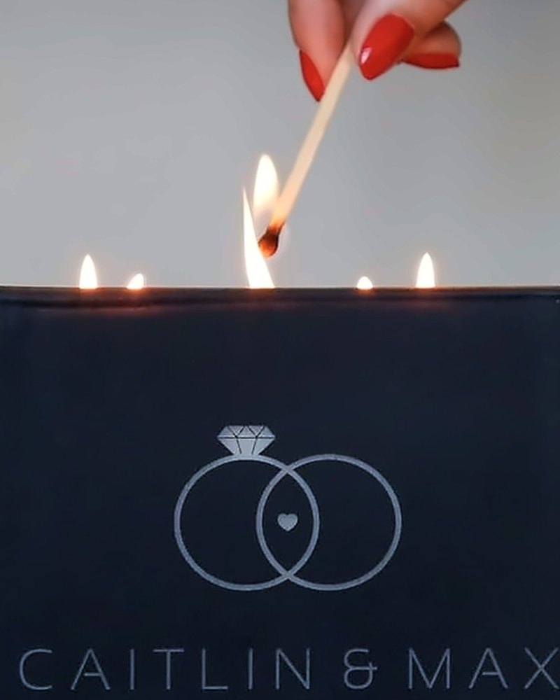 A lit black candle engraved with wedding rings, Caitlin + Max, Tony’s, Houston, TX, 9.4.2021
