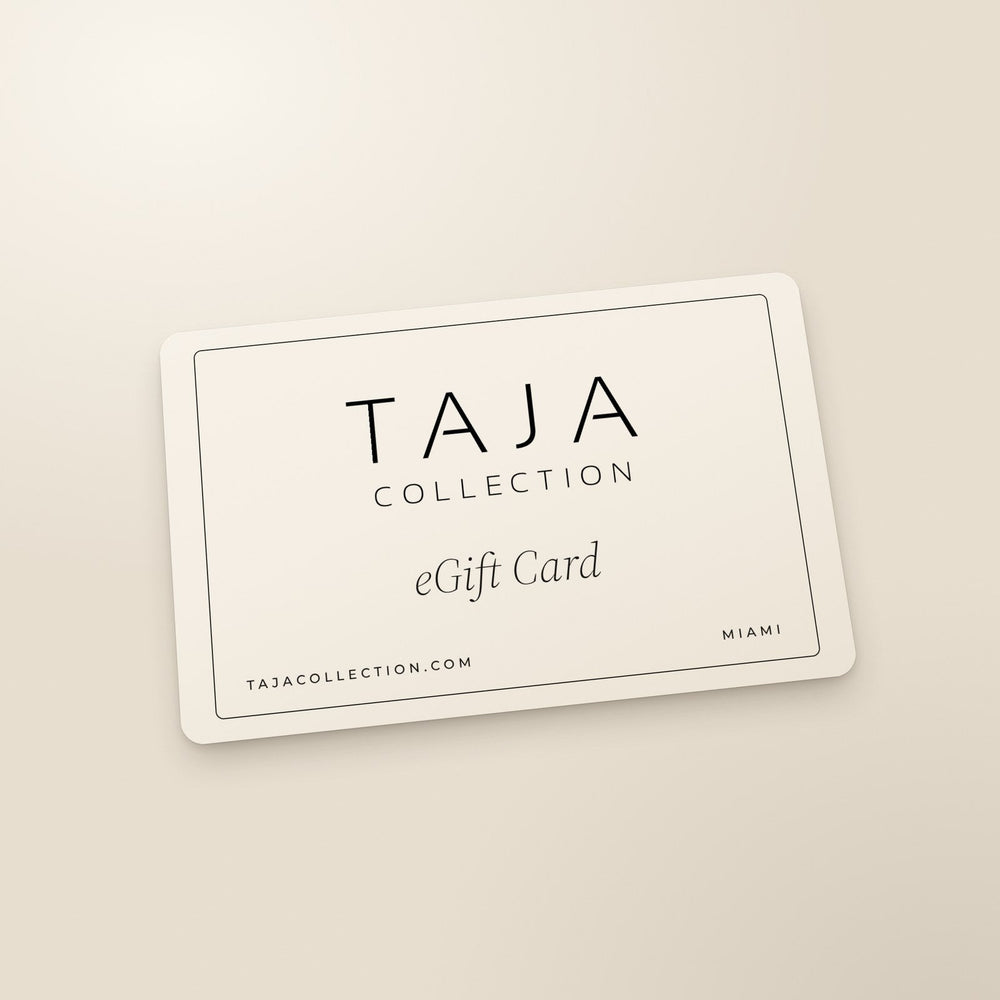 TAJA eGift Card: a bone card with a thin black border, the TAJA Collection logo and eGift Card