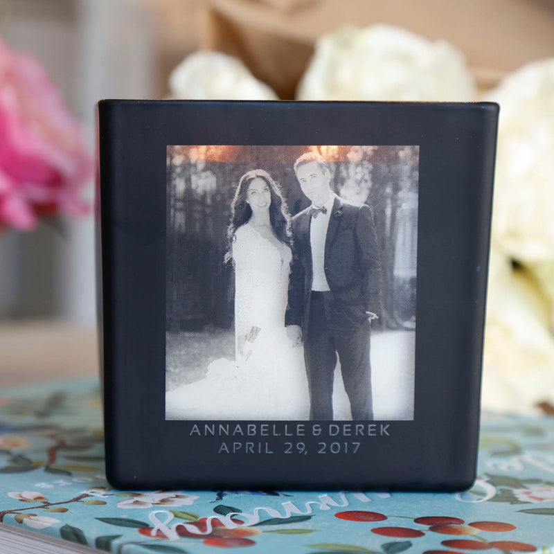 zoomed in photo of the love card candle. black super candle