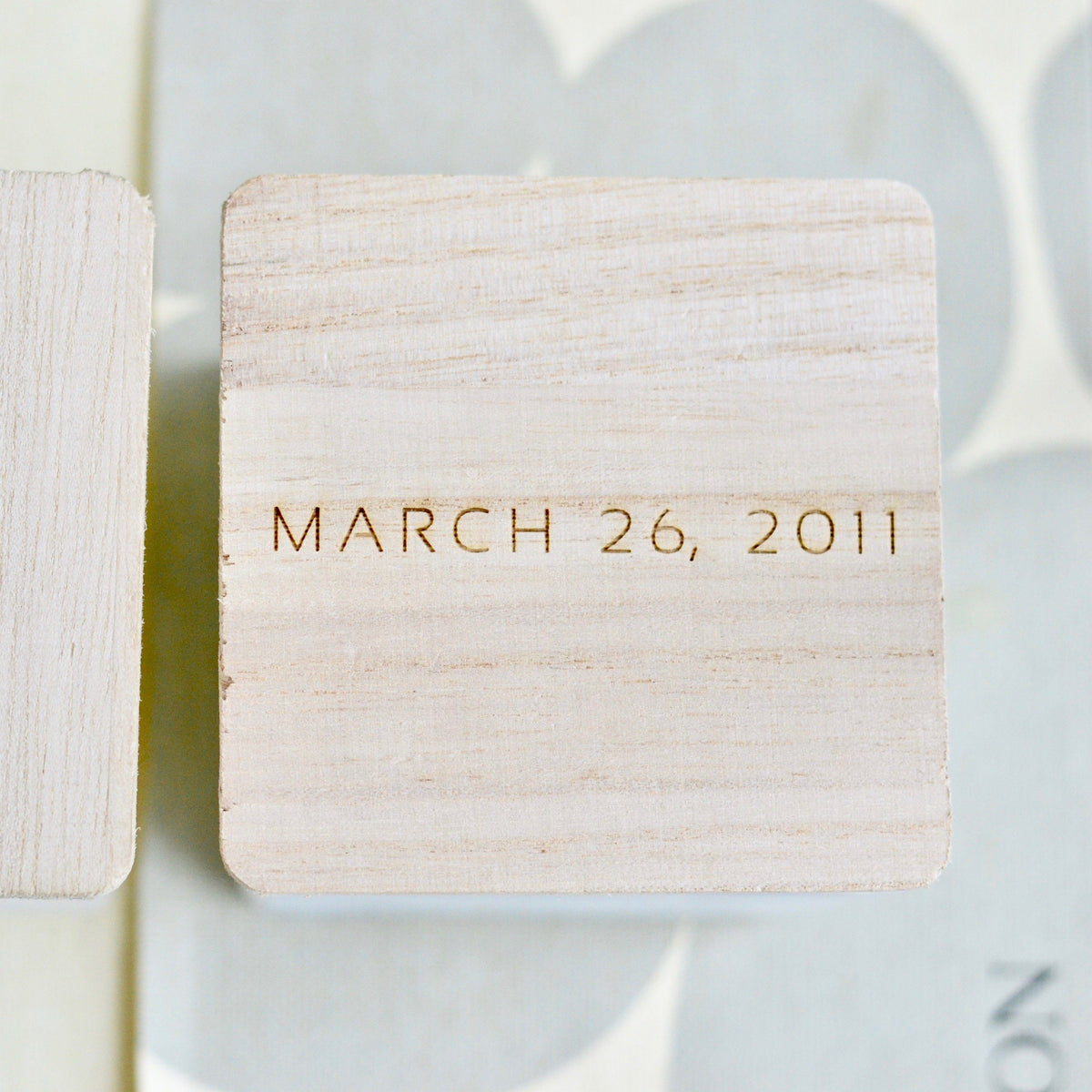 Wooden lid engraved March 26, 2011