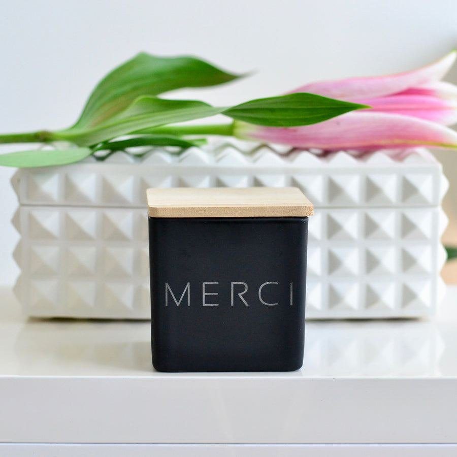 Black glass candle engraved Merci
