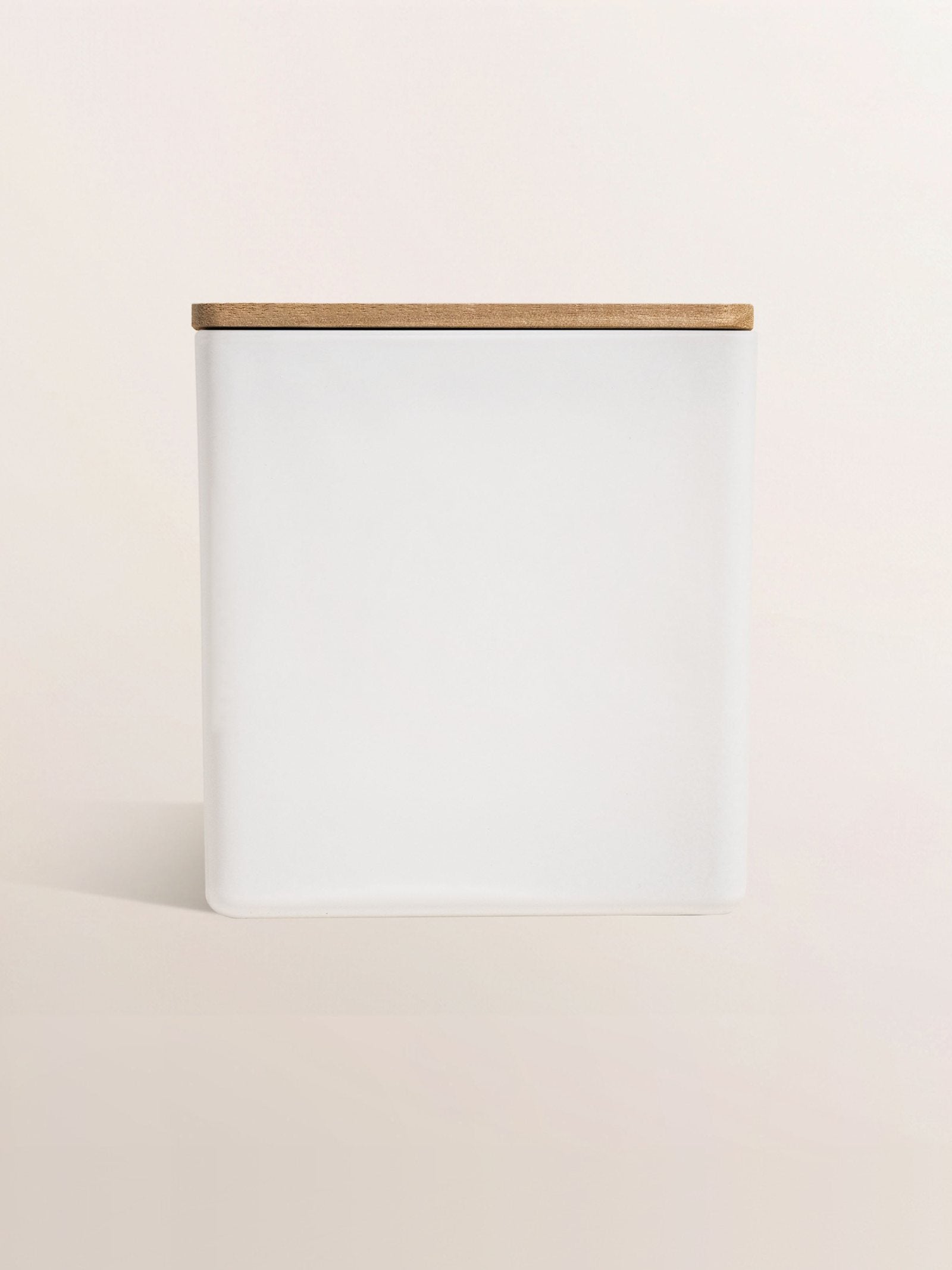 Matte white jar with a wood lid