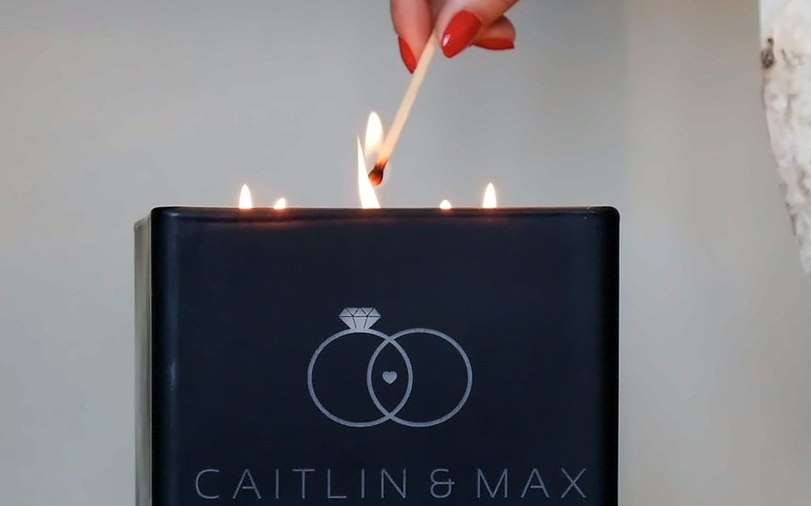 A lit black candle engraved with wedding rings, Caitlin + Max, Tony’s, Houston, TX, 9.4.2021
